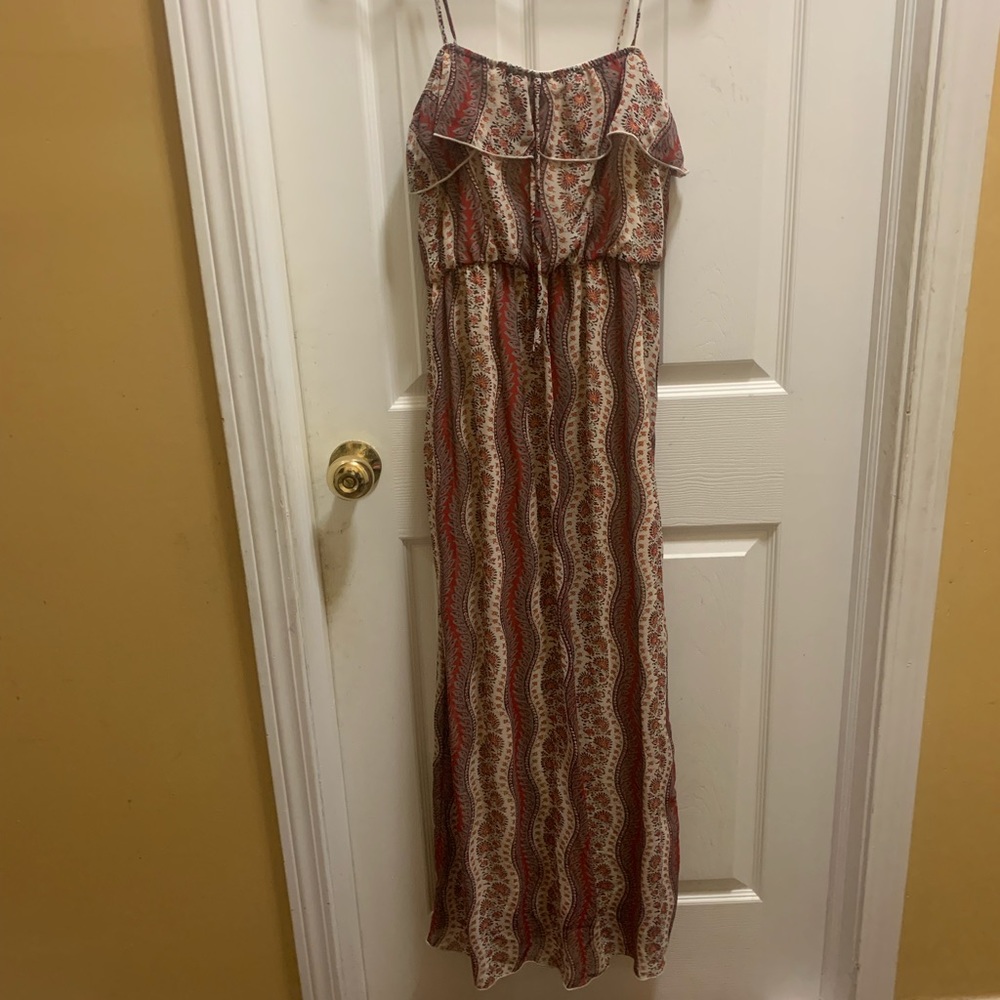 3 Maxi dresses. Never worn. 2 long 1 knee length